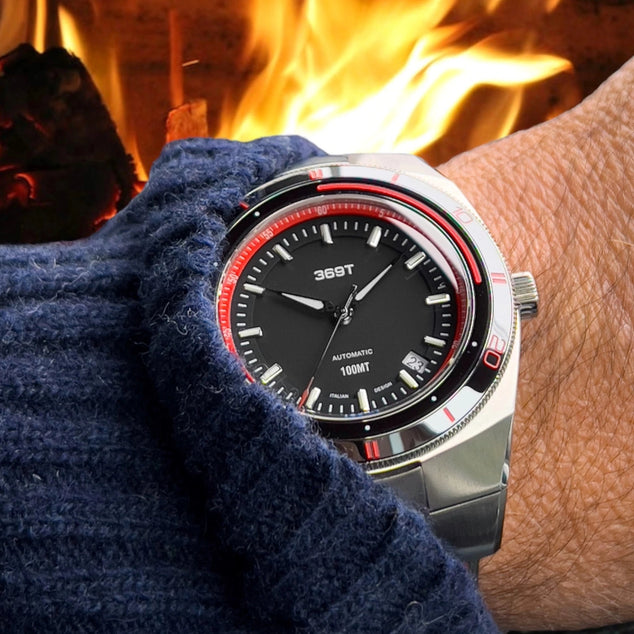 369 T Red Bezel matched with a navy knitwear in front of the fireplace