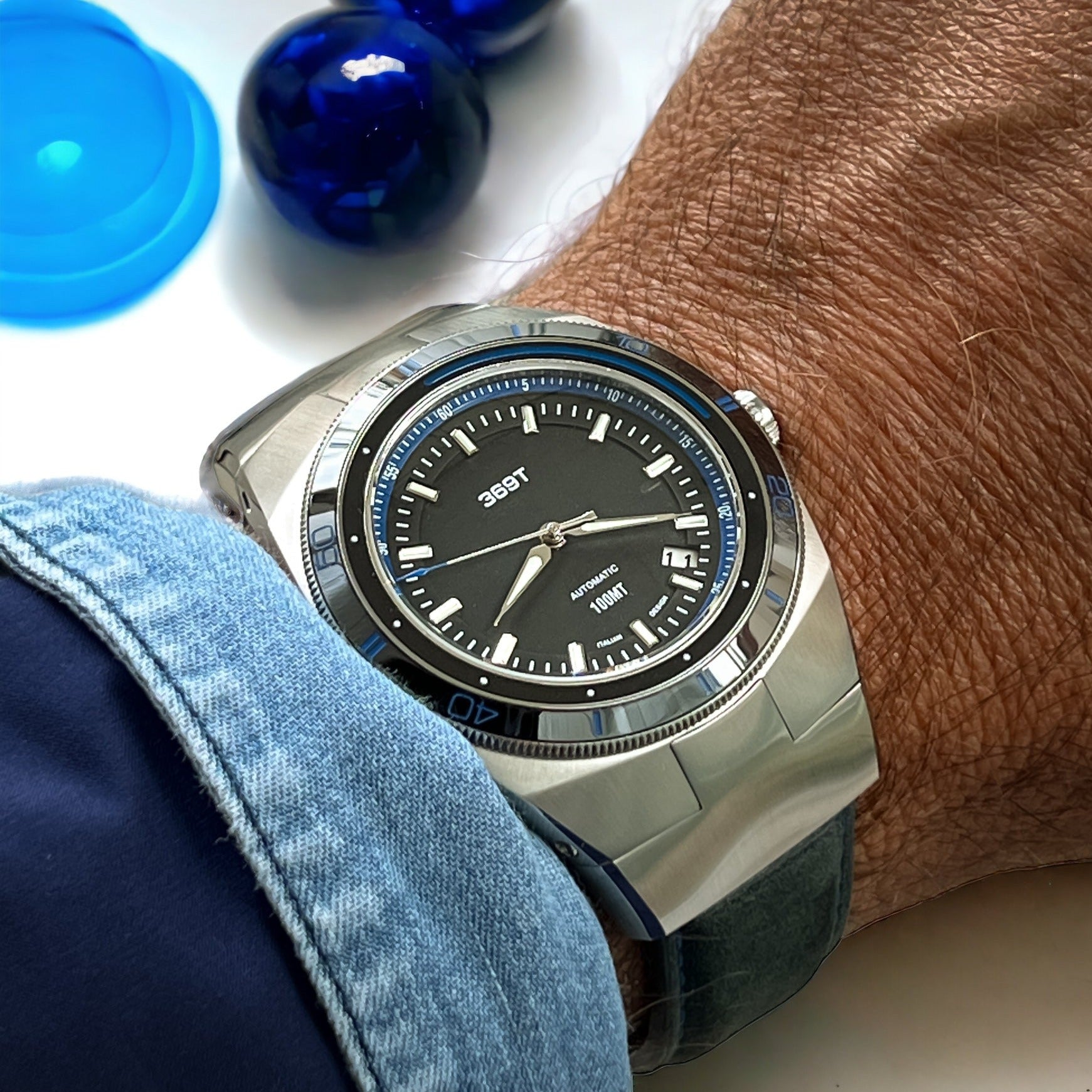 369 T Blue Bezel with the colosseum dial in evidence