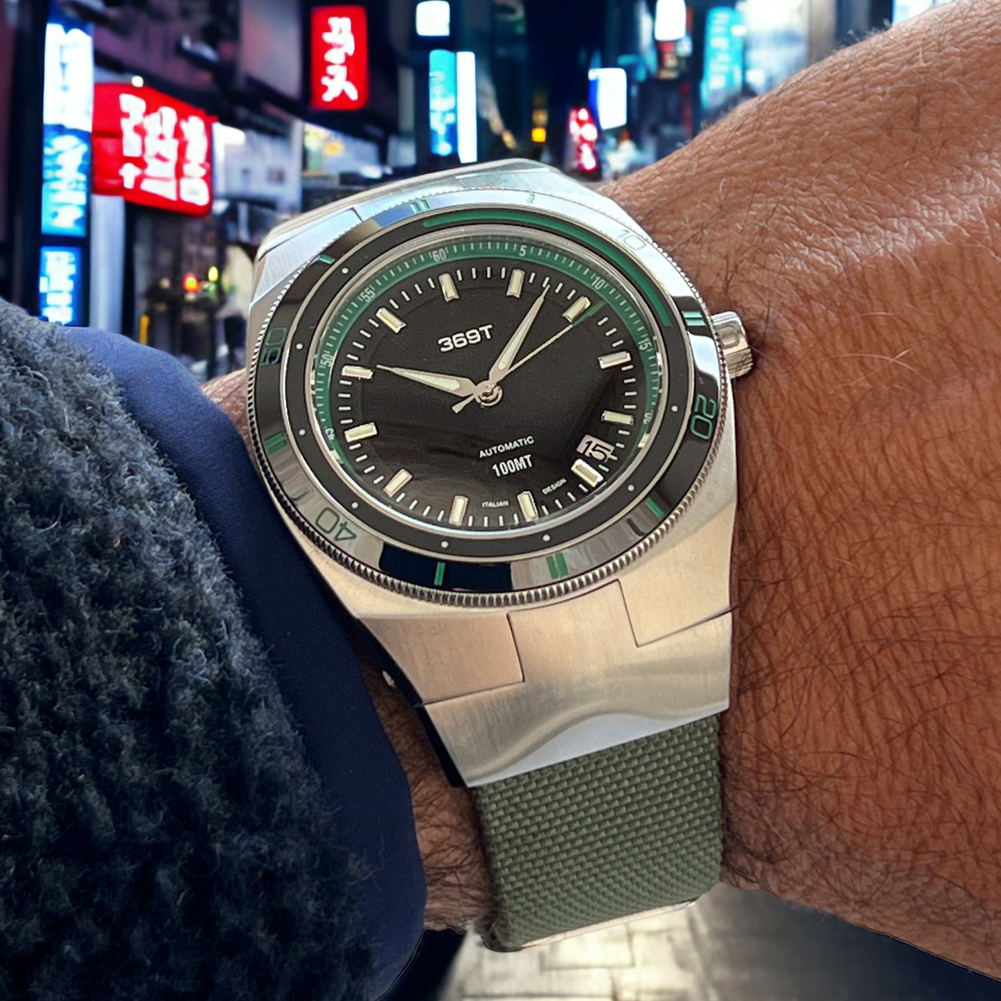 369 T Green Bezel with canvas strap with Tokyo's street in the background